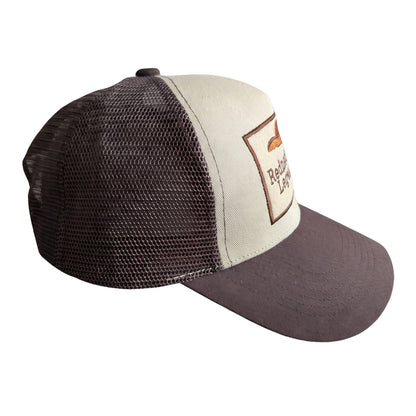 Redneck Legends Cream &amp; Brown Trucker Hat — side profile, cream front panel, brown mesh back and curved brown brim