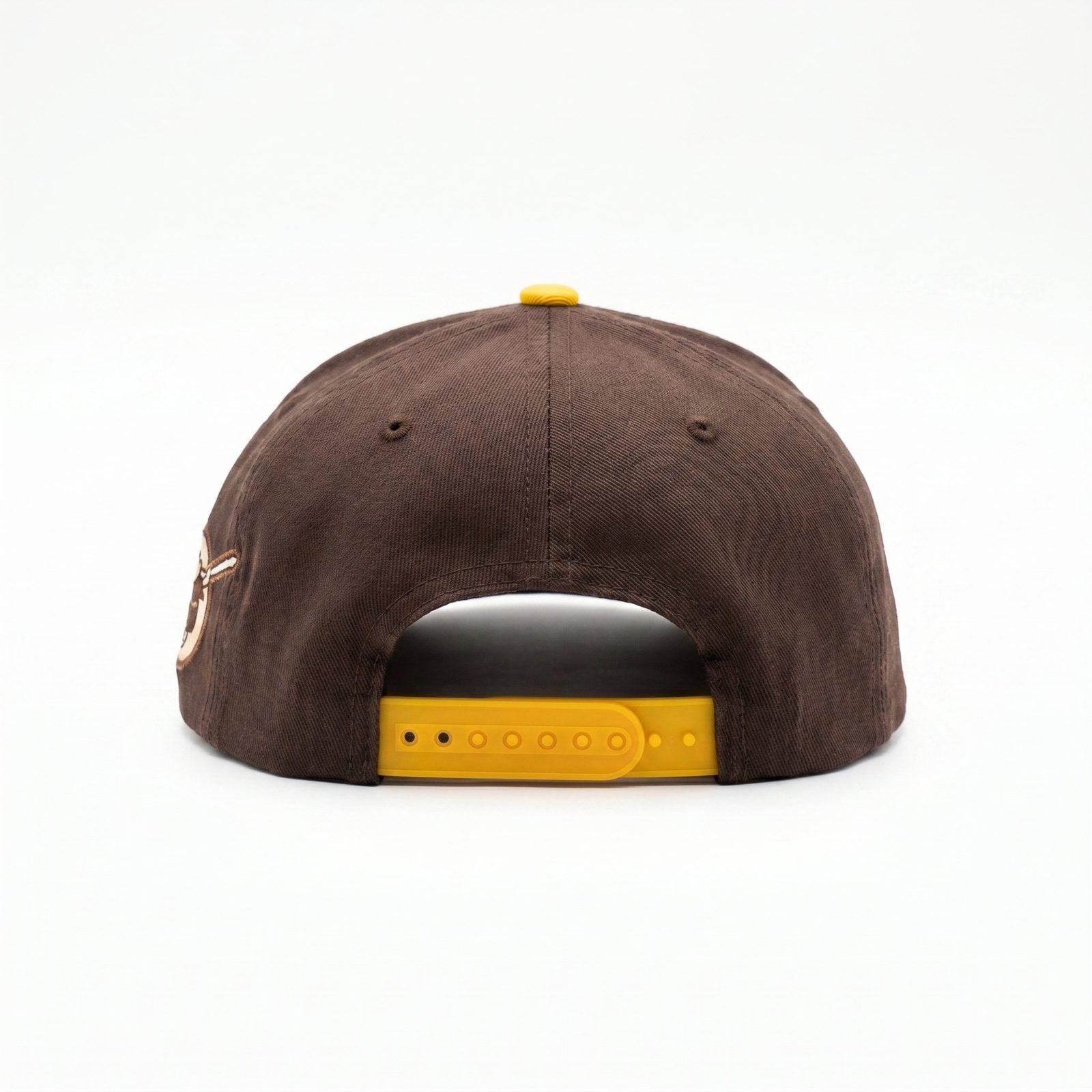 Brown &amp; Gold Snapback Cap by Redneck Legends — back view of the brown crown with an adjustable golden-yellow snapback closure.
